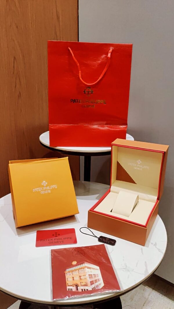 Genuine Patek Philippe watch box with outer cover, booklet, and cushion