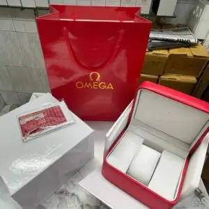 OMEGA watch box with outer cover, booklet, and cushion